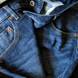 Relaxed skinny destructed denim